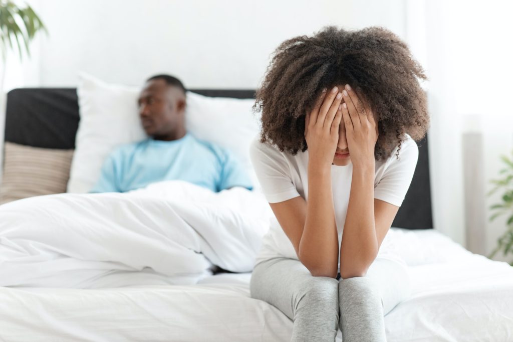 Sad lovers after quarrel ignoring, avoiding sex, frustrated couple not talking